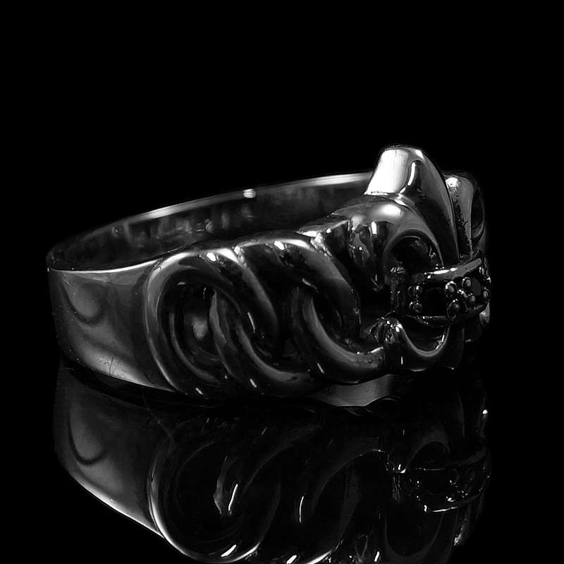 Knotenring mit Fleur de Lis und Zirkonia